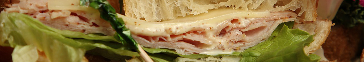 Eating Italian Pizza Sandwich at Italian Kitchen restaurant in Washington, DC.